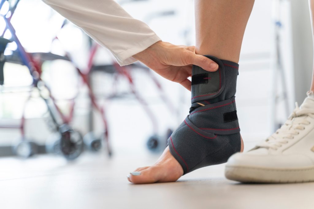 Close-up of a woman's foot with a ankle brace